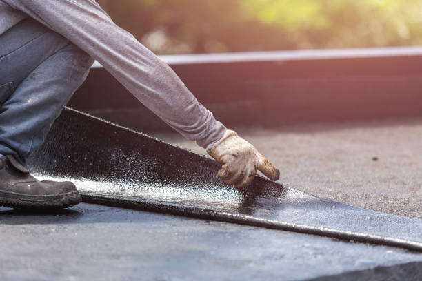Professional Waterproofing technician working in Oak Ridge, NC